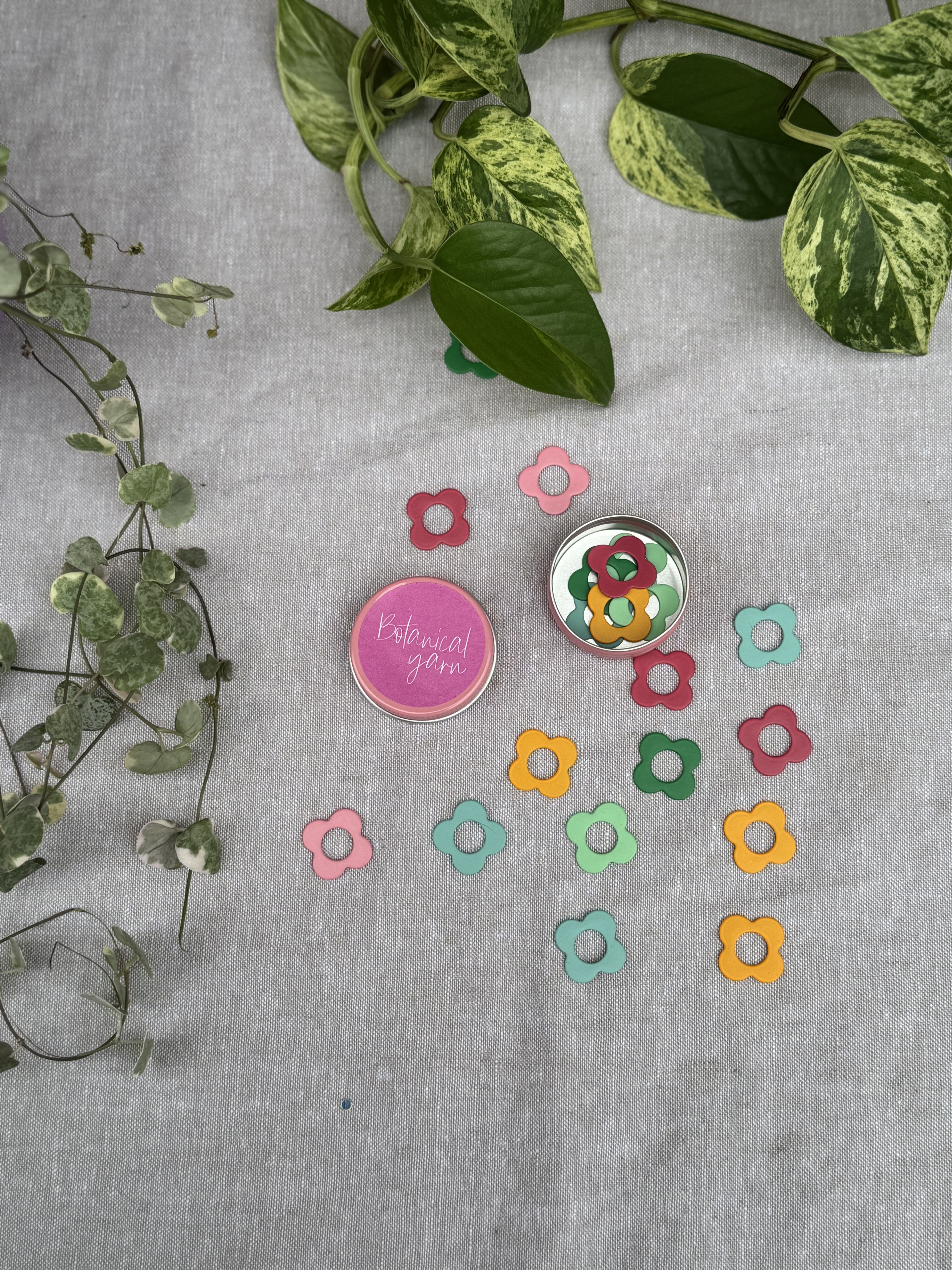 Flower four petal stitch markers in tin