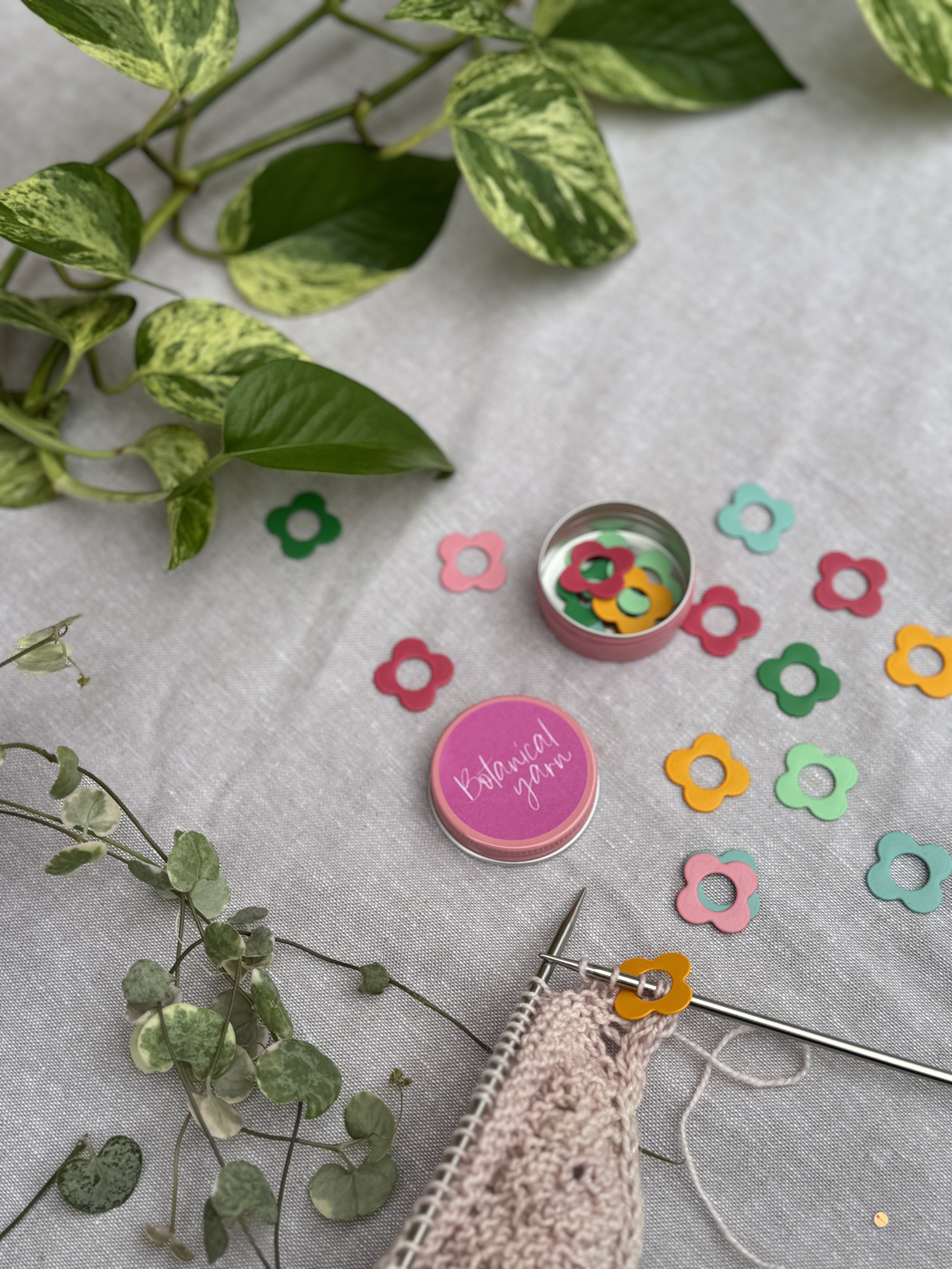 Flower four petal stitch markers in tin